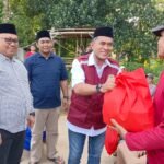 HUT PPNI Ke-50, Pj Wali Kota Palopo Berbagi Bingkisan di To’bulung