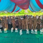 Sekda Morowali Buka Musrembang dan Serahkan Bantuan Pangan Atasi Kemiskinan Ekstrem di Bumi Raya